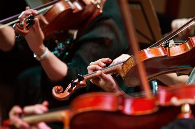 Hands of a woman playing the violin
