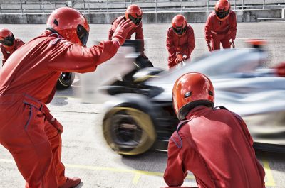 Racing team working at pit stop