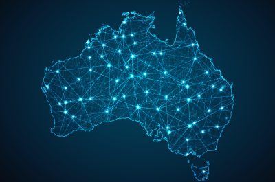 Australia map geometric mesh polygonal light. Business wireframe mesh spheres from flying debris blue structure style