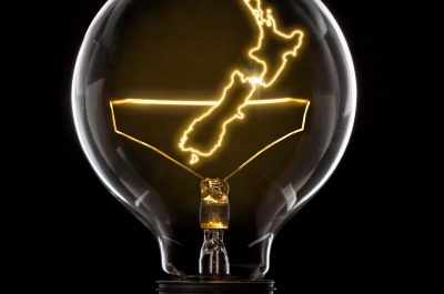 Lightbulb with a glowing wire in the shape of New Zealand (series)