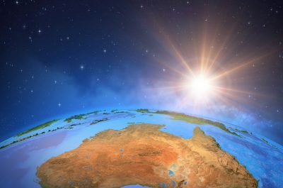 Sun shining over Australia from space